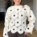 Haut en guipure florale contrastée