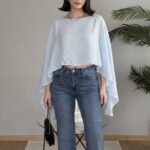 Haut court transparent à manches amples